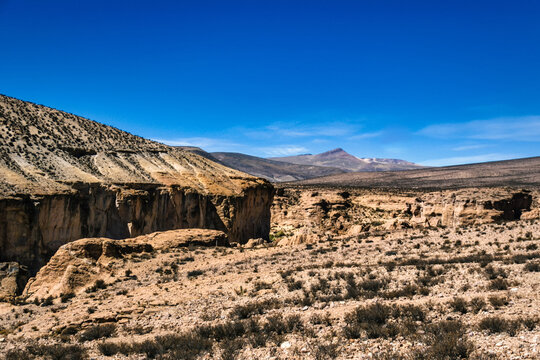 Large river canyon running through the Atacama Desert in the Arica y Parinacota Region of northern Chile.