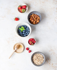 Obraz na płótnie Canvas Healthy diet. Useful ingredients. Delicious summer berries. Useful nuts.