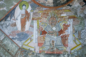 Detail of the bhavacakra or wheel of life in tibetan buddhism from a traditional wall painting in Simtokha dzong, Bhutan