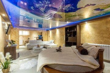 Interior of a romantic hotel bedroom with round bed