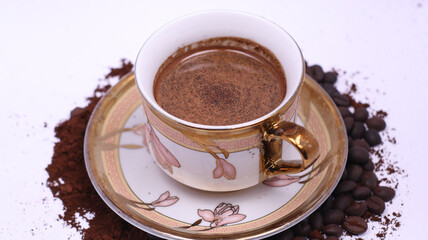 Coffee on cup isolated white background