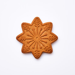 New Year gingerbread or snowflake shaped cookies isolated on white background. Square image. Top view.