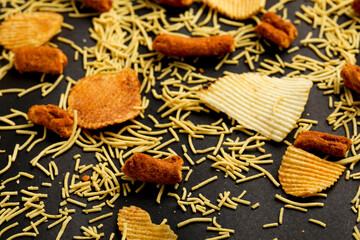 potato bhujiya or aloo bhujiya or sev namkeen and chips. mixed spicy snack