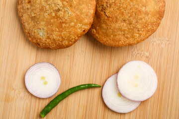 Kachori is a spicy snack from India also spelled as kachauri and kachodi.