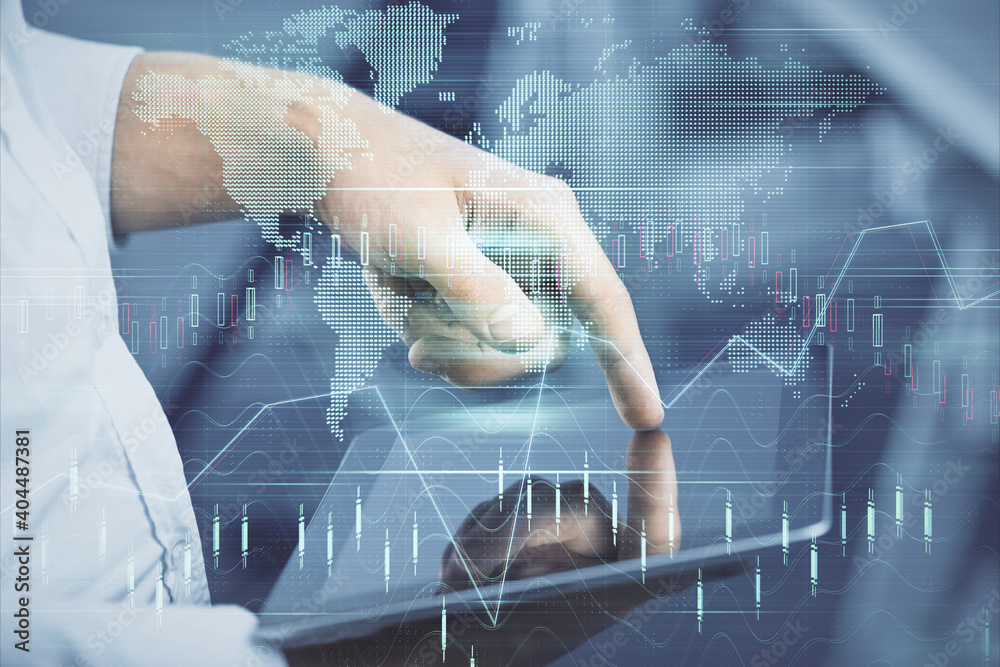 Poster double exposure of man's hands holding and using a digital device and forex graph drawing. financial