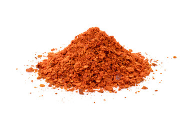 Heap red chili powder isolated on white