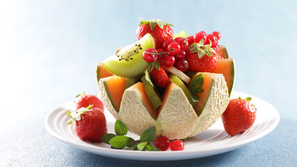 fresh fruits salad with melon,  kiwi,  banana and berries fruits