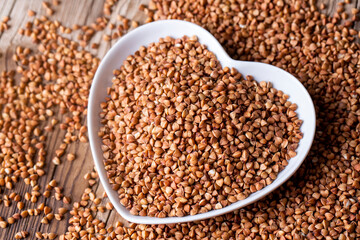 Buckwheat. Diet concept - Background texture of buckwheat - Macro shot of buckwheat texture.