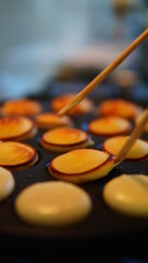 Dutch Pancakes Cooking on Pan