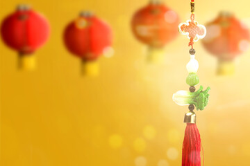 Chinese New Year Ornament with blurred Chinese lantern background