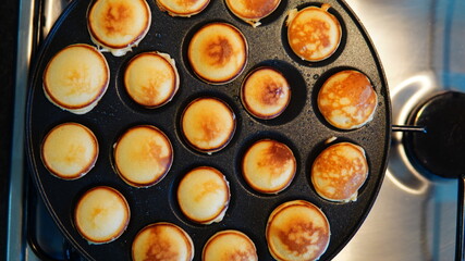 Dutch Pancakes Cooking on Pan
