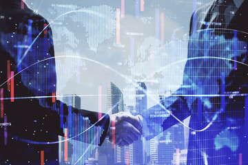 Double exposure of business theme hologram and handshake of two men. Success concept.