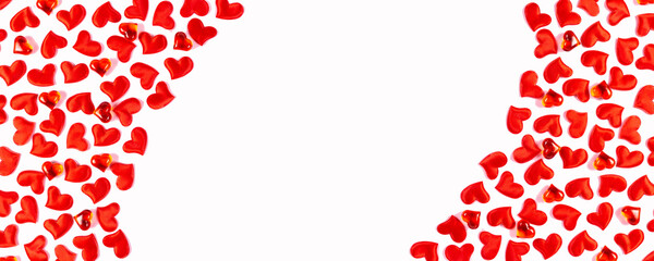 Valentine's Day, wedding, love concept. Celebration white background with red satin hearts. Top view, flat lay, copy space. Banner.