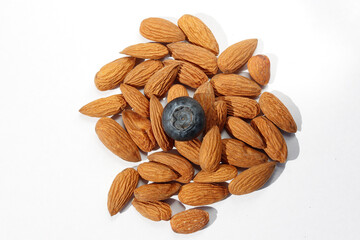 blackberry with nuts, healthy food on white isolated background 