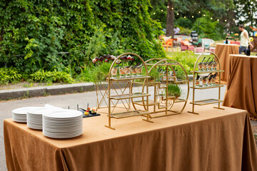 table and chairs in the  garden. Wedding banquet
