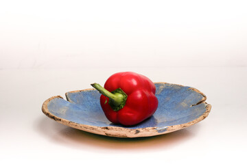 red and green peppers on a plate