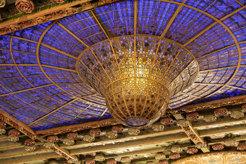 Stained-glass skylight of the Palau de la Musica Catalana's modernisme interior looks like a lamp...