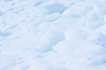 Fototapeta na wymiar Beautiful natural winter background. Pure white mountain snow . Hight quality photo