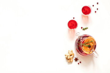 Fruit and berry tea with cranberries orange rosemary and cinnamon.