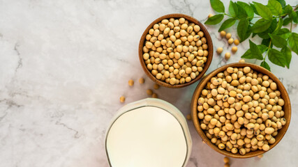 soybeans in wooden bowl with milk on the table.