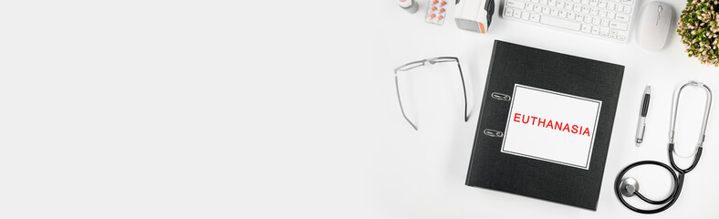 Doctor's workspace, in the center is a folder with the inscription: euthanasia