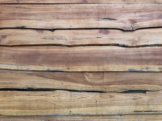 Old light color wood wall for seamless wood background and texture.