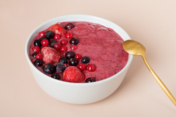 berry smoothie on a beige background