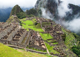Machu Picchu, panoramic view of peruvian incan town - obrazy, fototapety, plakaty