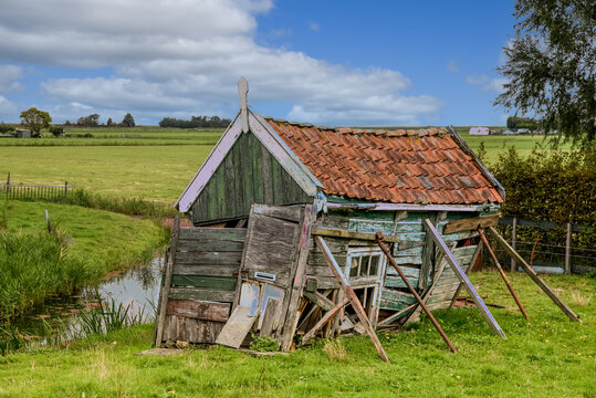 Old shabby barn on the former island of Marken, Holland.