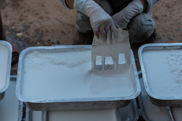 The process of producing rubber sheets, before the rubber sheets for sale to the rubber factory.