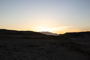 A sunset in the desert in Hurghada in the Egypt.