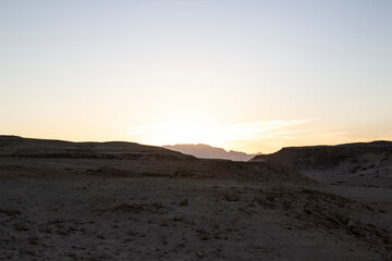 Fototapeta na wymiar A sunset in the desert in Hurghada in the Egypt.