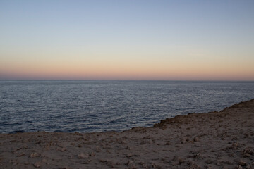 Beautiful and Calm sunset from the stones to the sea in the Hurghada in Egypt. Painting Sea sunset.