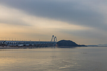 Obraz premium Sunset and fog and bridge