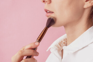 cosmetic stain on the collar of a girl's shirt. dirt stains for cleaning and washing concept