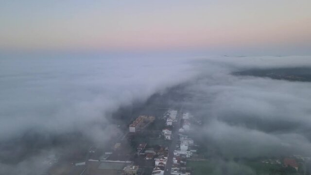 Flying from the clouds to discover town of Estoi in Algarve, Portugal