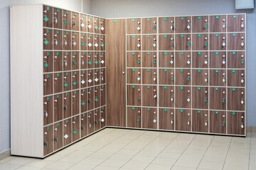 lockers with numbers in fitness center. gym storage system