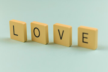 Valentine's Day minimal banner with love word and letters, macro close up background