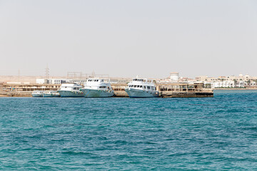 Fototapeta na wymiar View at boats in the egyptian harbor, Hurghada.