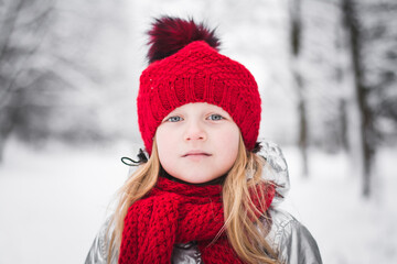 Happy Baby Girl portrait In red Hat Outdoor