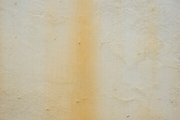 old wall with off white and rust coloured painted texture background. Stock Photo.