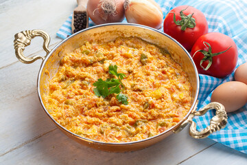 Traditional turkish food (Turkish name; menemen) made by eggs and tomatoes.