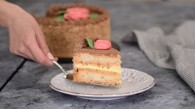 Homemade kiev cake, dacquoise cake with butter cream and hazelnuts.