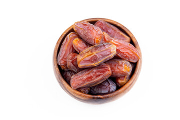 Pile of dried dates on a white
