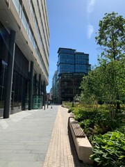 Spinningfields in Manchester City centre with modern buildings and beautiful gardens. 