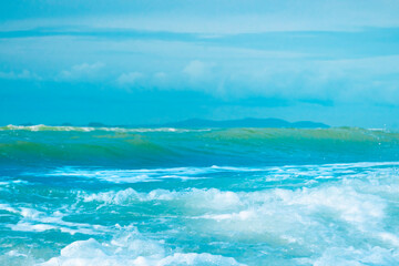 Fototapeta na wymiar Beautiful ocean blue waves in morning.