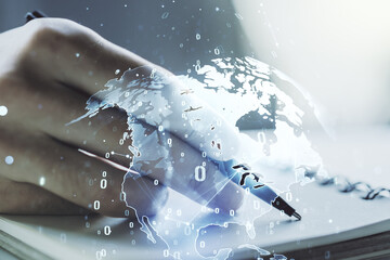 Double exposure of abstract creative programming illustration with world map and man hand writing in notepad on background, big data and blockchain concept