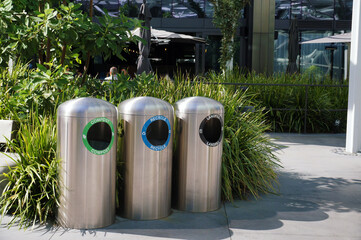 Selective waste collection. Publicly accessible containers in urban space.