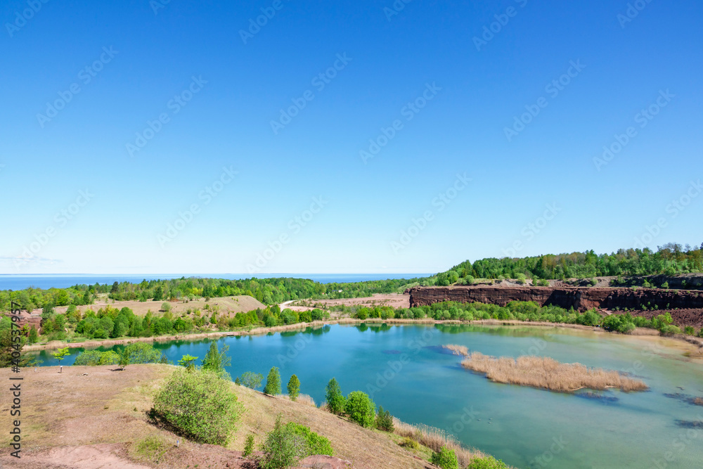 Poster View of an old quarry with a lake