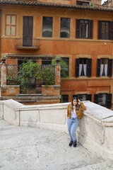 Fototapeta na wymiar Satisfied traveler enjoying Italian streets and squares